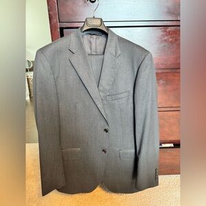 Men's gray Coppley black label two piece suit. Size 44r.